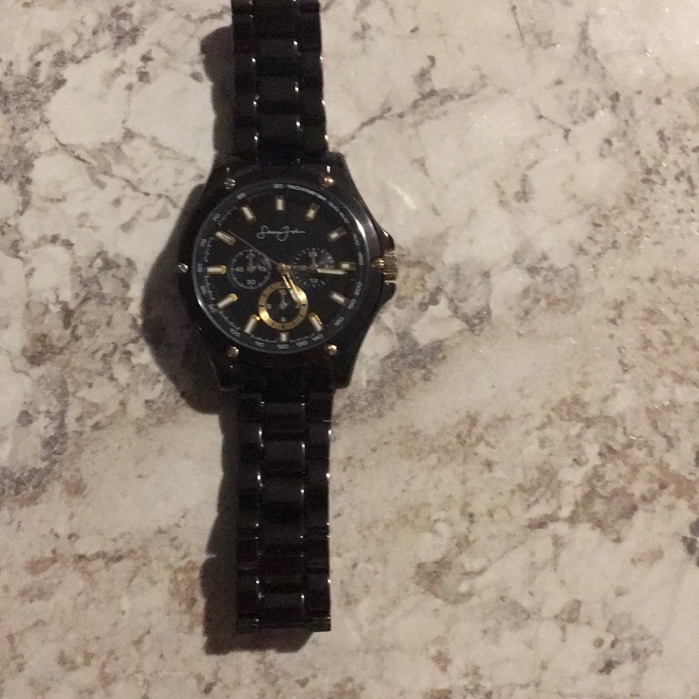 Sean John watch all black and sweet gold in all the right places large fit all l